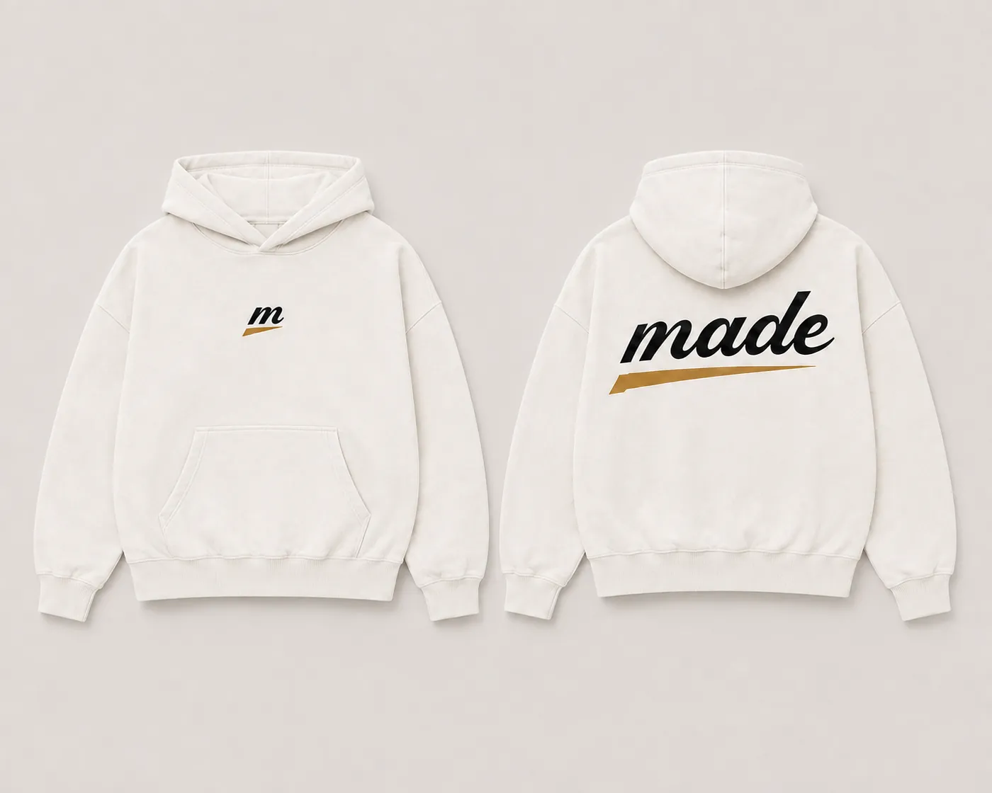 MADE Hoodie in bone with the black m icon centred on the chest and the made wordmark with a gold glide underline at the back